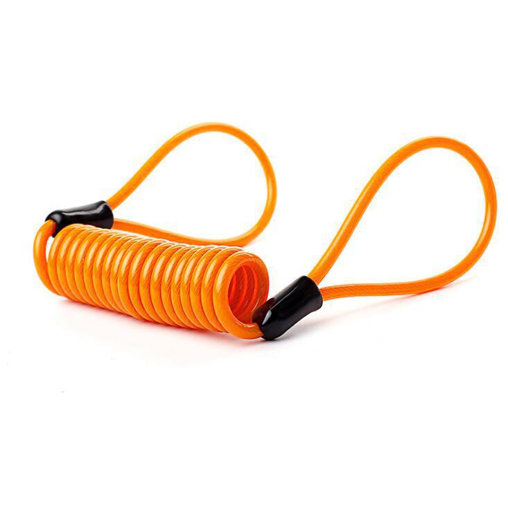 Coiled orange safety cable with black ends on a white background