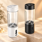 Two portable electric blender cups with transparent bodies, one in white and one in black, displayed on stone blocks against a warm beige background.