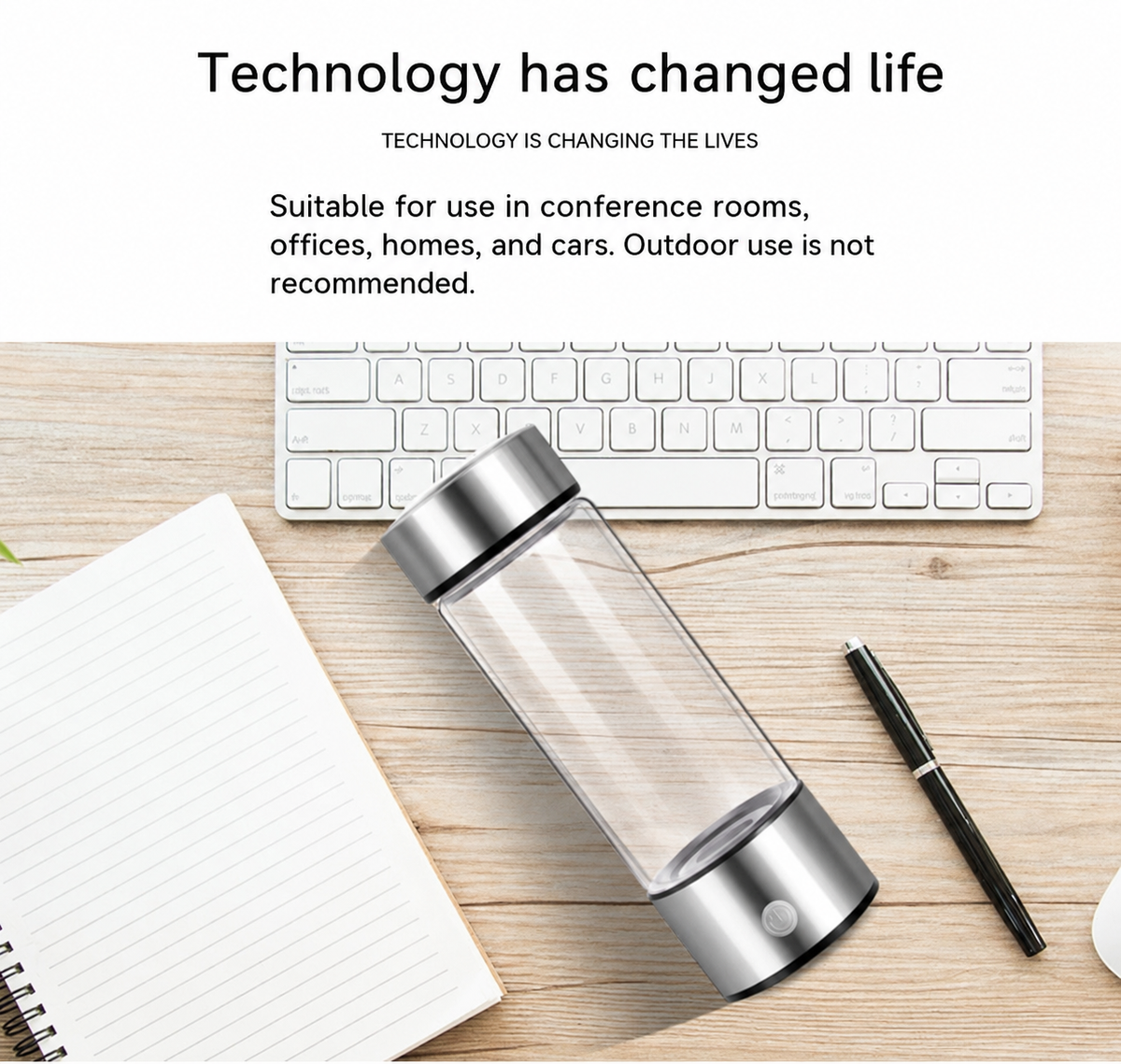 Glass hydrogen water bottle with metallic silver caps, placed on a light wood desk next to a keyboard, notebook, and pen. Text at the top reads, 'Technology has changed life' and describes suitable indoor use environments.