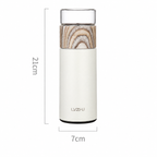 White portable tea infuser bottle with a transparent cap, wood-grain detail, and 21 × 7 cm dimensions.
